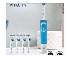 Oral B Vitality 100 Blue Criss Cross Electric Rechargeable Toothbrush Powered By Braun